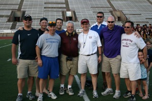 a few of the coaches pose for a photo following the Tony DeMeo Coaches Clinic